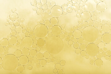 Drops of fat in water. Bubbles of fat close up. Oil