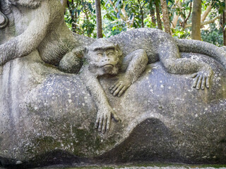 Fototapeta na wymiar Indonesia, Bali, Ubud. Statue in Bali Sacred Monkey Forest.
