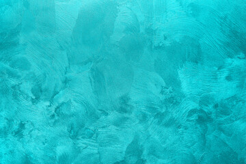 Abstract background of textured wall of cyan color.