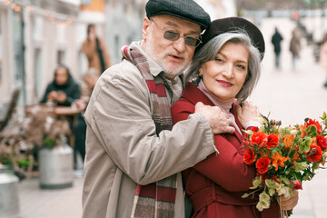 Elderly senior love couple. Old retired man woman together on romantic date.Aged husband wife...