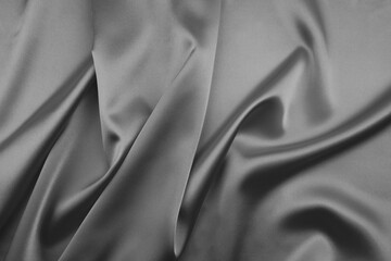 grey satin or silk fabric as background