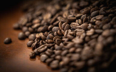 Raw Coffee Beans on Brass Countertop 
