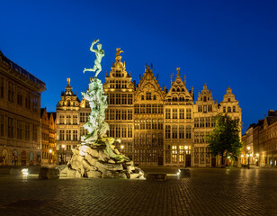 Fototapeta na wymiar Brabo fountain at the Grote Markt square after sunset in Antwerp, Belgium