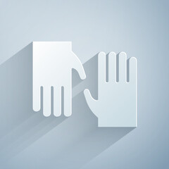 Paper cut Rubber gloves icon isolated on grey background. Latex hand protection sign. Housework cleaning equipment symbol. Paper art style. Vector