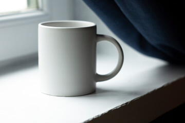 White mug on the windowsill - 532280810
