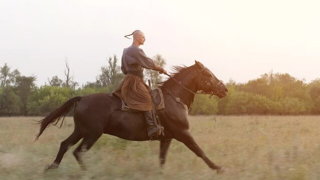 Zaporizhian Cossack with on horseback. Ukrainian ancient warrior. Soldier. Infantryman. Cavalry. Cossack Rider on a horse. Strong people.