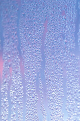 Fototapeta na wymiar Texture of misted glass in winter.