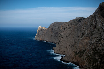 Fototapeta na wymiar Single sunrays are shining the Cap de Formentor on Mallorca.