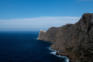 Fototapeta na wymiar Single sunrays are shining the Cap de Formentor on Mallorca.