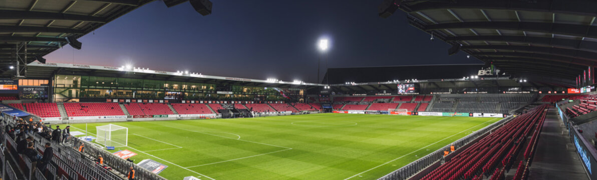 Night game under floodlights at the illuminated MCH Arena (Herning Stadion), home stadium for FC Midtjylland. Herning, Denmark - September 2022