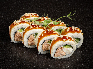 tasty sushi on the black background