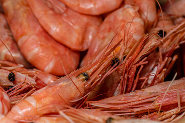 Detail photo of boiled red shrimp ready to be eaten.