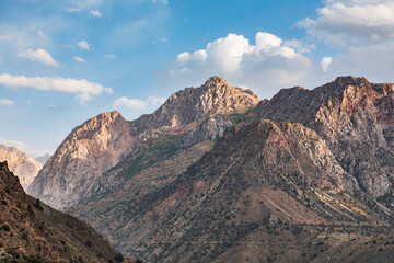 Iskanderkul, Sughd Province, Tajikistan. Rugged arid mountains and blue sky.