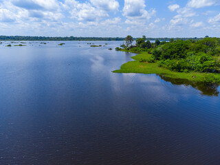 Aerial view of Igapó, the Amazon rainforest in Brazil, an incredible green landscape with lots of water and untouched nature