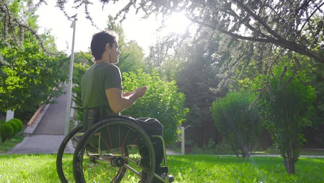 Disabled youth sitting in a wheelchair praying.
Prayer. Young disabled person sitting in wheelchair praying.
