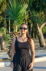 Portrait of a young beautiful girl on a sunny day