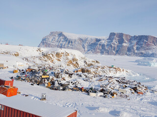 The junkyard. Town Uummannaq during winter in northern West Greenland beyond the Arctic Circle....