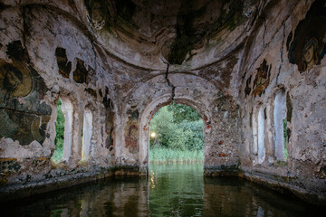 Obraz premium Large flooded hall of ruined abandoned church