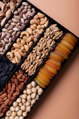 Nuts and dried fruits in a black box.