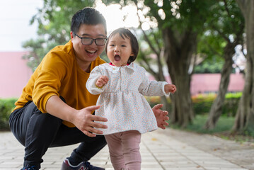 father and daughter having fun