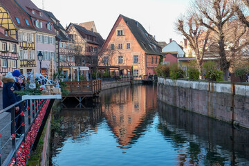 Fototapeta na wymiar Colmar, France. Old town Colmar which was founded in the 9th century. Old homes along the river front.