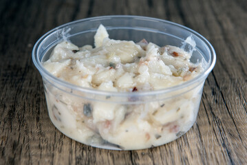 Lunch is complimented with a side order of  potato salad in a resuable container