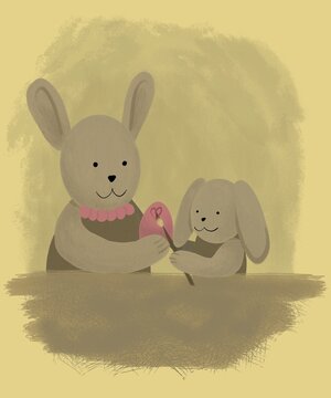 Cute rabbits mother and child painting egg