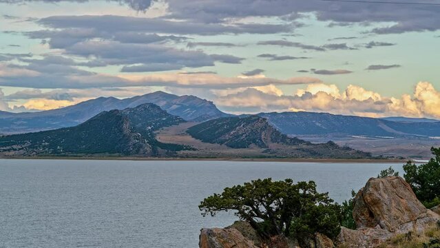 Looking across Flaming Gorge towards Richard's Mountain in timelapse as clouds move through the sky.
