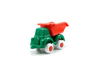 green paint plastic toy mining truck isolated on white