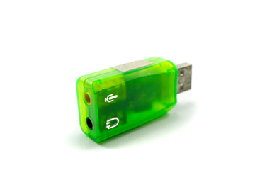 Green USB 2.0 sound card and two inputs for microphone and headset
