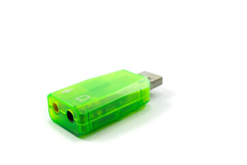 Green USB 2.0 sound card and two inputs for microphone and headset