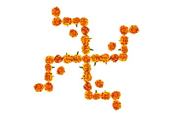 marigold flower frame indian gujarati hindu religious symbol swastik or swastika for marriage invitation,diwali,new year,ganesh chaturthi,festival related concept background