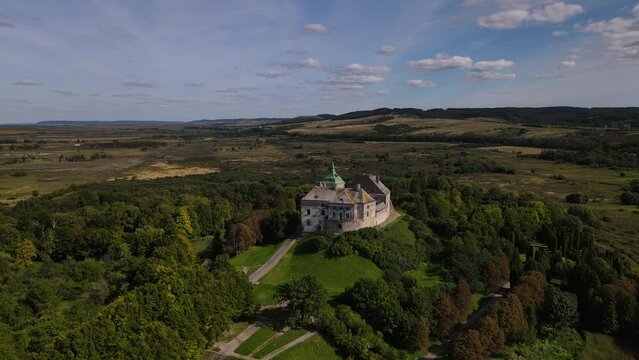 Aerial panoramic view of the surviving medieval rectangular fort Zolochiv Castle in Ukraine, drone flies forward