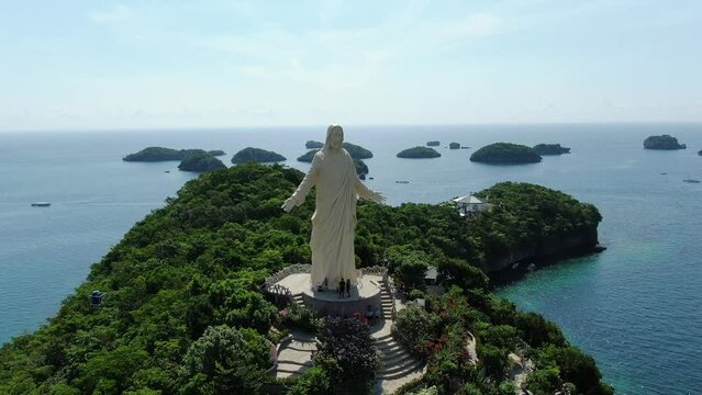 4k Aerial Drone shot of statue of Jesus Christ in pangasinan alaminos hundred islands philippines 