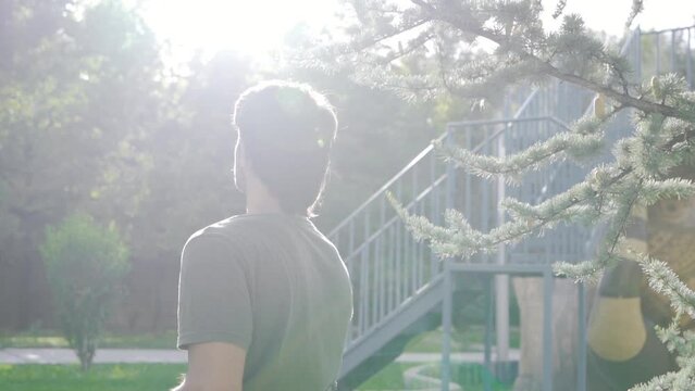 Disabled teenager is outside on a beautiful sunny day. Slow Motion.
Disabled teenager is outside on a beautiful sunny day.
