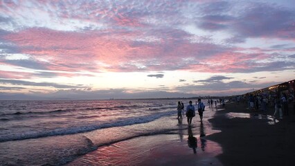 FUJISAWA, KANAGAWA, JAPAN - AUGUST 2022 : View of Enoshima beach (sea) at Shonan area in sunset. Romantic, moody sky in dusk. Japanese hot summer holiday (vacation) season concept video.