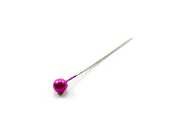 pink sewing straight pin isolated on white background.