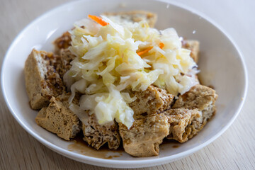 Famous Taiwanese snack of stinky tofu on the table