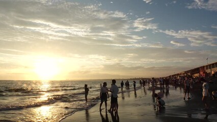FUJISAWA, KANAGAWA, JAPAN - AUGUST 2022 : View of Enoshima beach (sea) at Shonan area in sunset. Time lapse shot, dusk to night. Japanese hot summer holiday (vacation) season concept video.
