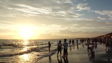 FUJISAWA, KANAGAWA, JAPAN - AUGUST 2022 : View of Enoshima beach (sea) at Shonan area in sunset. Time lapse shot, dusk to night. Japanese hot summer holiday (vacation) season concept video.