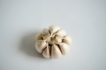 Close up raw garlic isolated on white background.