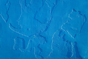 Peeling blue concrete old wall texture or background.