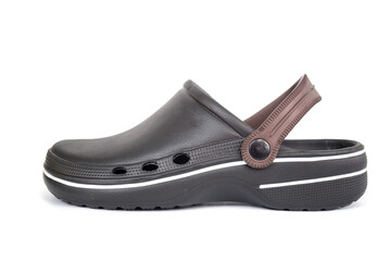 Black rubber sandals covering toes isolated on white background