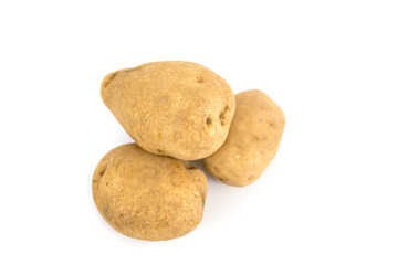 Fototapeta na wymiar Three fresh potatoes isolated on a white background.