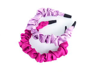 Beautiful luxury red and pink headband made of plastic covered in soft cloth