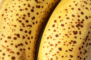 Yellow color, banana texture - micro image. Texture of ripe organic banana closeup