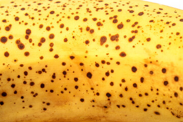 Yellow color, banana texture - micro image. Texture of ripe organic banana closeup