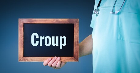 Croup. Doctor shows sign/board with wooden frame. Background blue