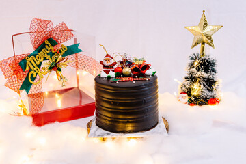Chocolate cake with fresh berries in christmas setting