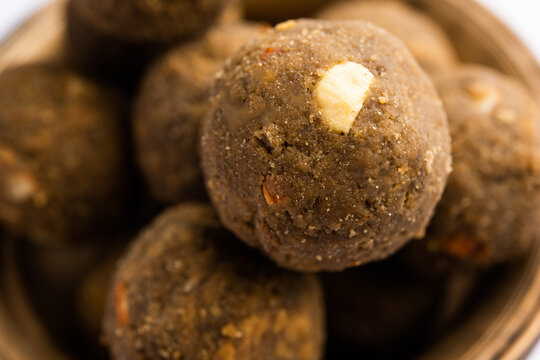 Bajra Atta Ladoo or kuler laddoo - Millet Flour Laddu, a popular winter sweet snack food from India